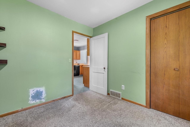 8020 Ridgeway Dr, Burlington, WI 53105 - unfurnished bedroom featuring carpet floors and a closet