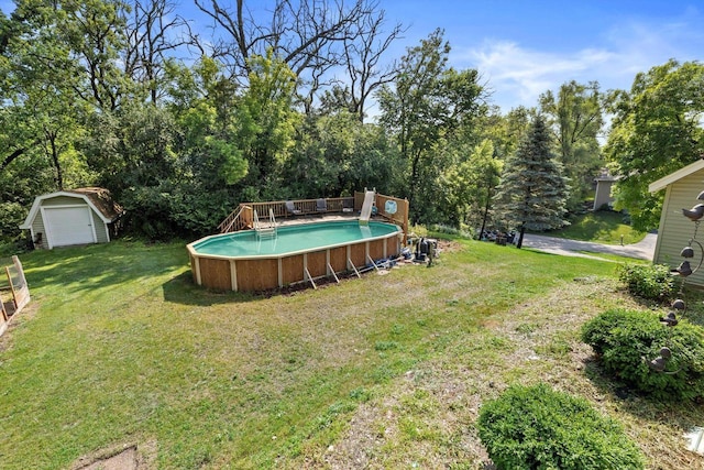 8020 Ridgeway Dr, Burlington, WI 53105 - view of grassy yard featuring a shed, an outdoor pool, and a deck