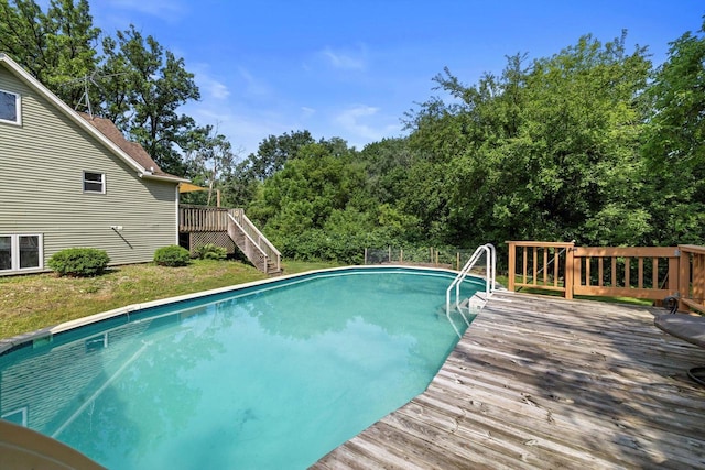 8020 Ridgeway Dr, Burlington, WI 53105 - outdoor pool with a wooden deck and stairs