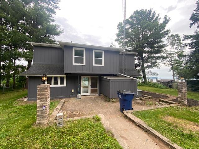 202361 Dubay Dr, Mosinee, WI 54455 - rear view of property with a yard