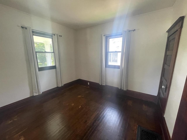 510 S Vine Ave, Marshfield, WI 54449 - empty room with dark wood-style floors
