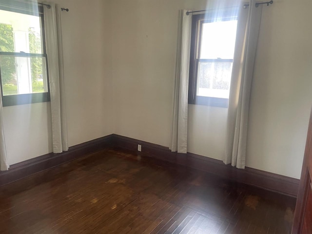 510 S Vine Ave, Marshfield, WI 54449 - spare room featuring dark wood finished floors