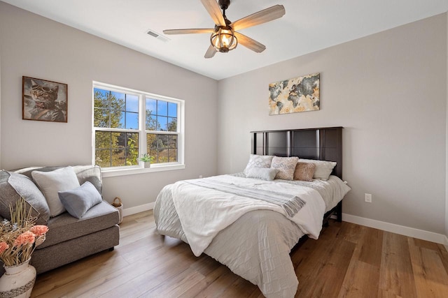 1883 Woodland Way, Slinger, WI 53086 - bedroom with wood finished floors and a ceiling fan