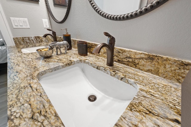 1883 Woodland Way, Slinger, WI 53086 - bathroom view of double vanity and a textured wall