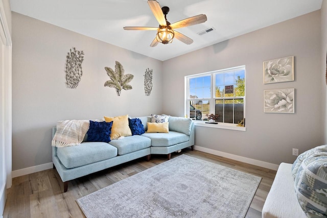 1883 Woodland Way, Slinger, WI 53086 - living area with ceiling fan and wood finished floors