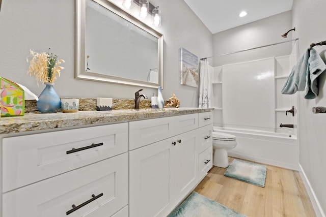 1883 Woodland Way, Slinger, WI 53086 - full bathroom with wood finished floors, vanity, and shower / bath combo with shower curtain