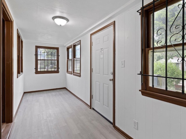 5751 N 38th St, Milwaukee, WI 53209 - hallway featuring light wood-style floors and ornamental molding