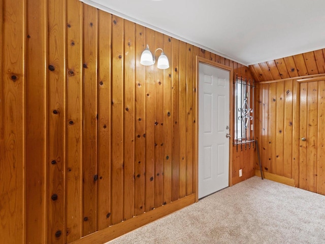 5751 N 38th St, Milwaukee, WI 53209 - entryway featuring carpet floors and wood walls