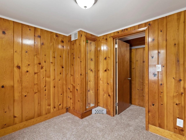 5751 N 38th St, Milwaukee, WI 53209 - unfurnished room featuring carpet flooring and wood walls