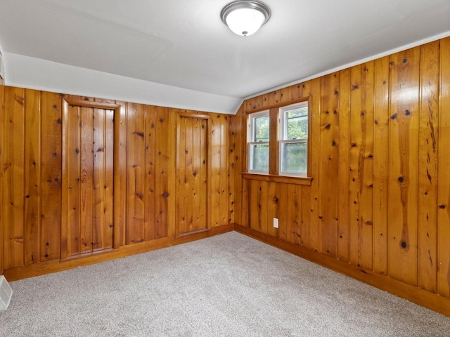5751 N 38th St, Milwaukee, WI 53209 - carpeted empty room featuring wood walls