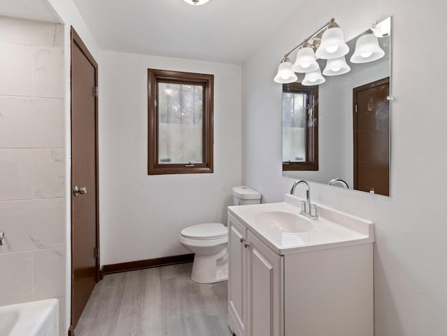 5751 N 38th St, Milwaukee, WI 53209 - full bathroom featuring wood finished floors and vanity