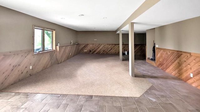 14900 Lax Chapel Rd, Kiel, WI 53042 - below grade area with wood walls, wainscoting, and stairs