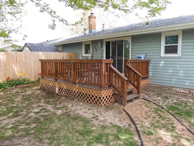 1581 Biemeret St, Green Bay, WI 54304 - rear view of property featuring a deck and a chimney