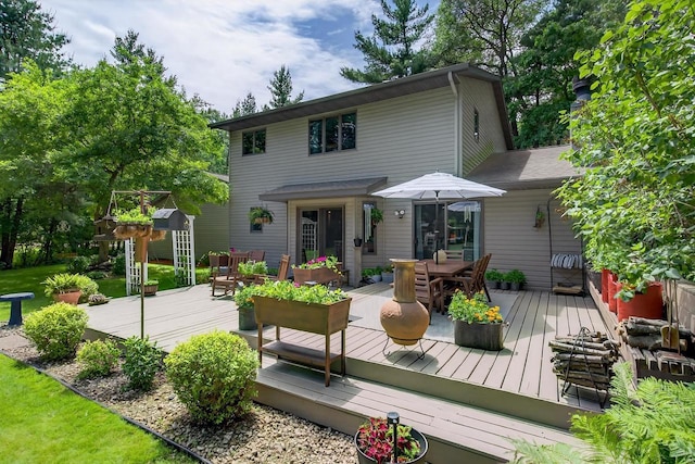 5111 Timberland Trl, Wisconsin Rapids, WI 54494 - rear view of property featuring outdoor dining area and a deck