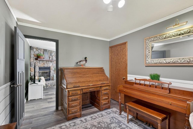 5111 Timberland Trl, Wisconsin Rapids, WI 54494 - office space with wood finished floors, crown molding, and a fireplace