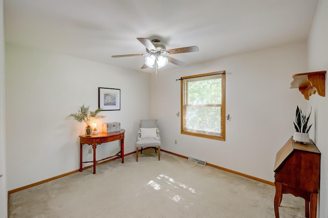 851 Hennessy St, Oshkosh, WI 54904 - sitting room featuring ceiling fan and carpet flooring