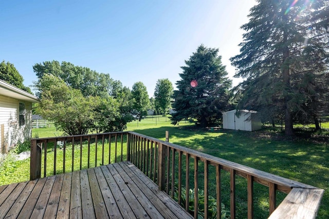851 Hennessy St, Oshkosh, WI 54904 - wooden terrace featuring a shed and a fenced backyard