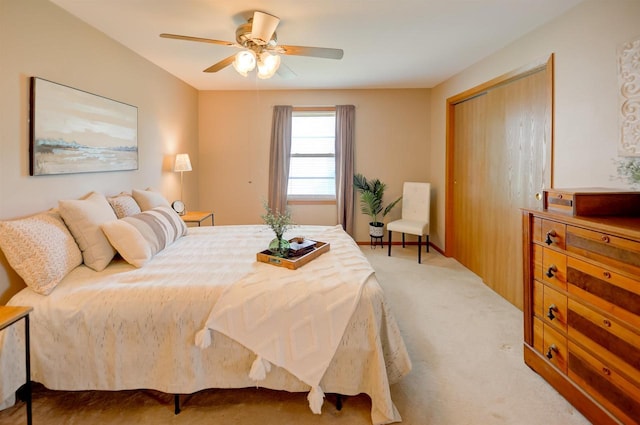 851 Hennessy St, Oshkosh, WI 54904 - bedroom with light colored carpet, a closet, and a ceiling fan