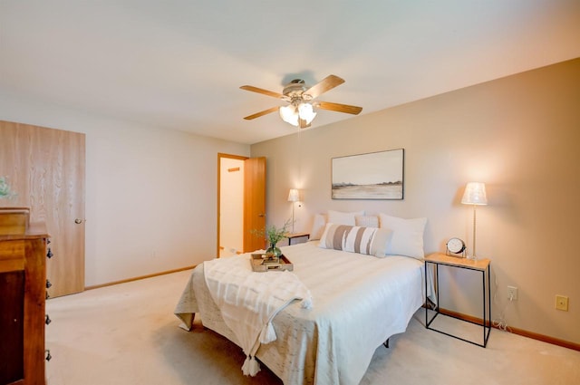 851 Hennessy St, Oshkosh, WI 54904 - bedroom featuring light colored carpet and ceiling fan
