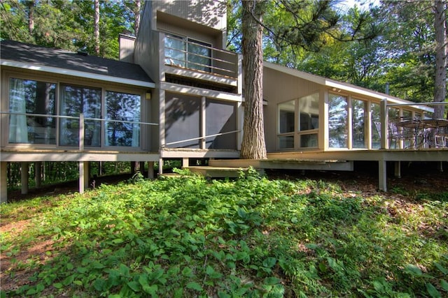 8674 Nor Wis Rd, Hayward, WI 54843 - back of property featuring a sunroom