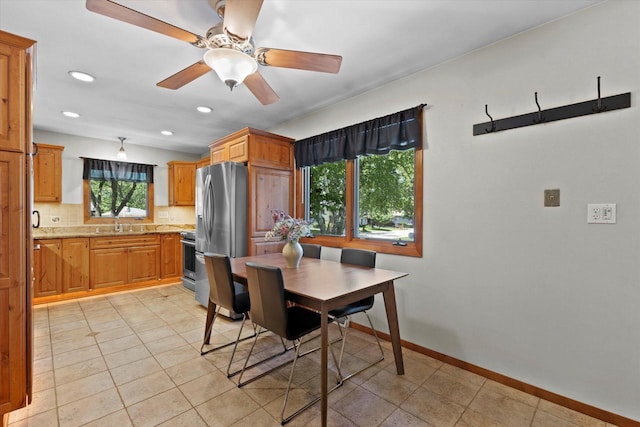 6196 N River Trail Dr, Milwaukee, WI 53225 - dining area with recessed lighting, ceiling fan, and light tile patterned floors