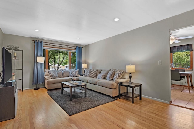6196 N River Trail Dr, Milwaukee, WI 53225 - living room featuring plenty of natural light, light wood-style floors, a ceiling fan, and recessed lighting