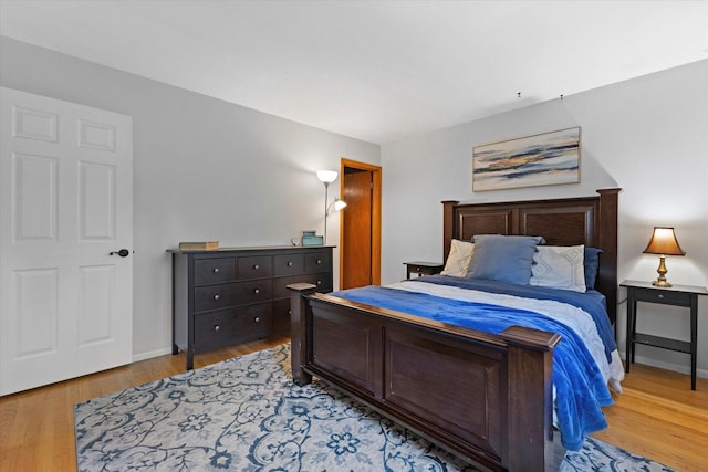 6196 N River Trail Dr, Milwaukee, WI 53225 - bedroom featuring light wood-style floors and baseboards