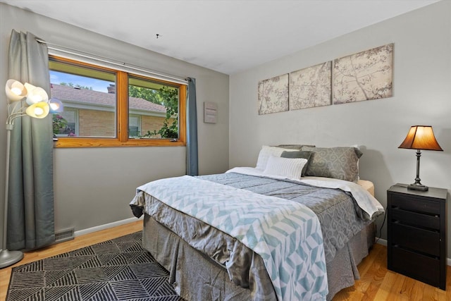 6196 N River Trail Dr, Milwaukee, WI 53225 - bedroom with wood finished floors and baseboards