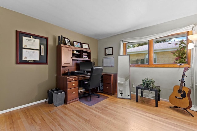 6196 N River Trail Dr, Milwaukee, WI 53225 - home office with light wood finished floors