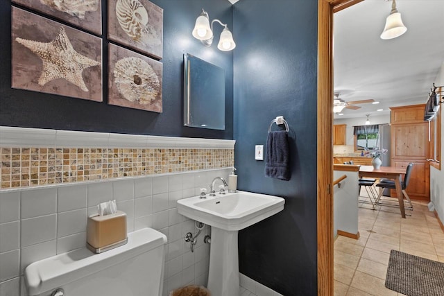 6196 N River Trail Dr, Milwaukee, WI 53225 - half bathroom featuring tile patterned floors and a ceiling fan