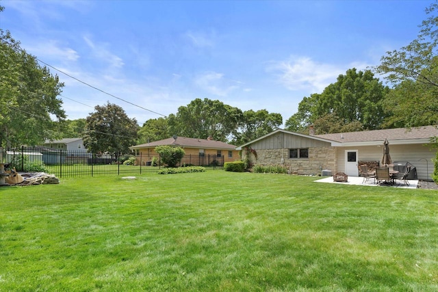 6196 N River Trail Dr, Milwaukee, WI 53225 - view of yard featuring a patio area