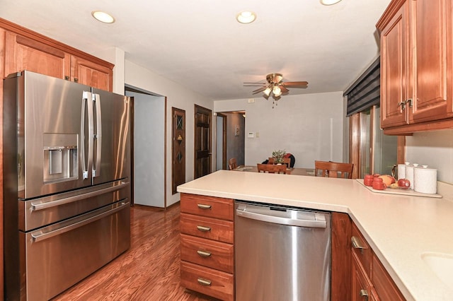 10500 W Good Hope Rd, Milwaukee, WI 53224 - kitchen featuring stainless steel appliances, a peninsula, light countertops, ceiling fan, and recessed lighting
