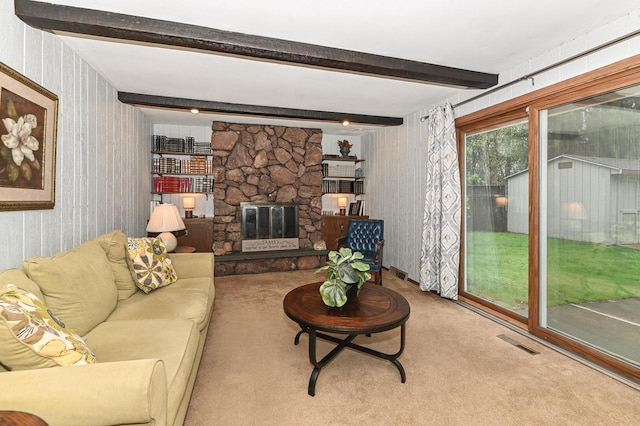 10500 W Good Hope Rd, Milwaukee, WI 53224 - living room with wallpapered walls, carpet floors, beam ceiling, and a fireplace