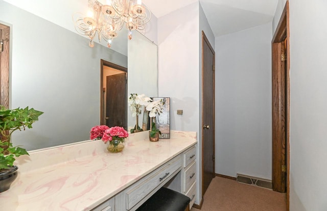 10500 W Good Hope Rd, Milwaukee, WI 53224 - bathroom featuring a chandelier and vanity