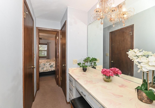 10500 W Good Hope Rd, Milwaukee, WI 53224 - ensuite bathroom with a chandelier and vanity