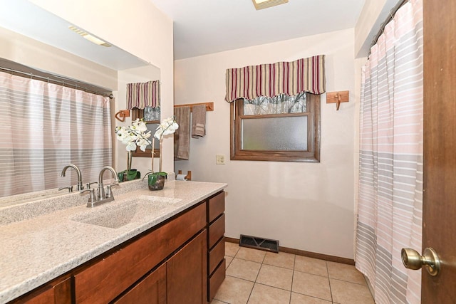 10500 W Good Hope Rd, Milwaukee, WI 53224 - full bath with vanity and tile patterned flooring
