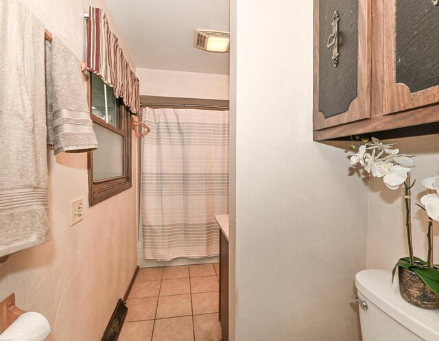10500 W Good Hope Rd, Milwaukee, WI 53224 - bathroom featuring tile patterned floors and a shower with shower curtain