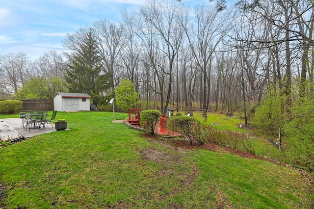 10500 W Good Hope Rd, Milwaukee, WI 53224 - view of yard with a storage unit, a patio area, and a deck