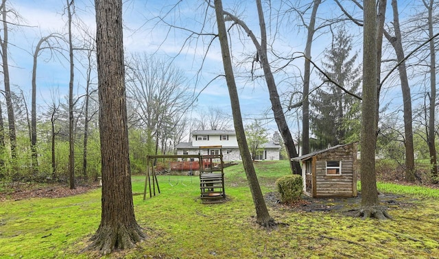 10500 W Good Hope Rd, Milwaukee, WI 53224 - view of grassy yard featuring a wooden deck, a storage shed, and stairway