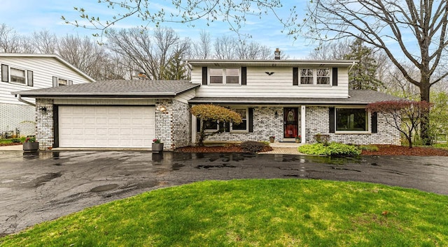 10500 W Good Hope Rd, Milwaukee, WI 53224 - traditional-style home featuring driveway, a garage, a porch, a chimney, and a front lawn