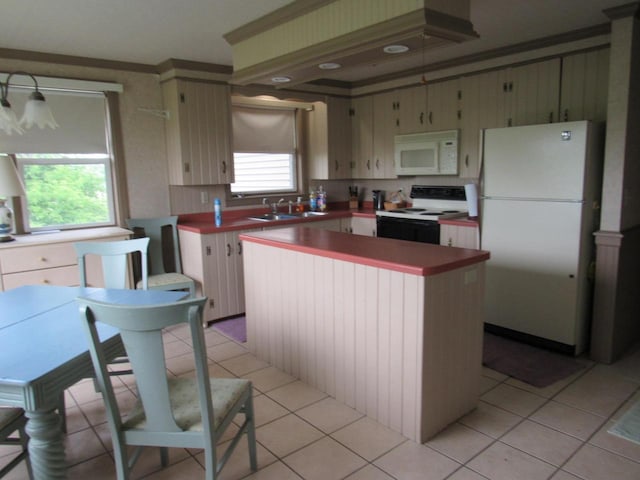 N3901 State Road 76, Hortonville, WI 54944 - kitchen featuring white appliances, light tile patterned flooring, a kitchen island, ornamental molding, and light countertops