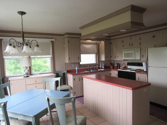 N3901 State Road 76, Hortonville, WI 54944 - kitchen with white appliances, a chandelier, plenty of natural light, a center island, and crown molding