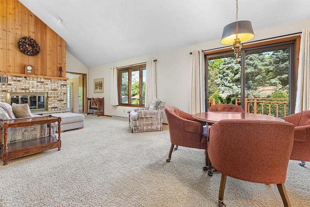 1334 W Cloverdale Dr, Appleton, WI 54914 - carpeted living room featuring healthy amount of natural light, high vaulted ceiling, and a brick fireplace