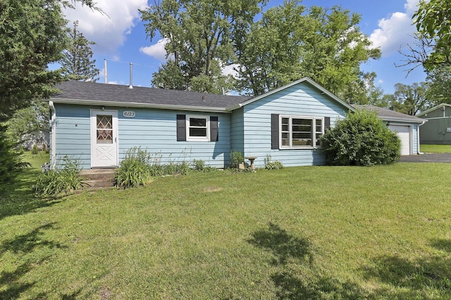 6123 245th Ave, Salem, WI 53168 - view of front facade with a front lawn, a garage, asphalt driveway, and roof with shingles