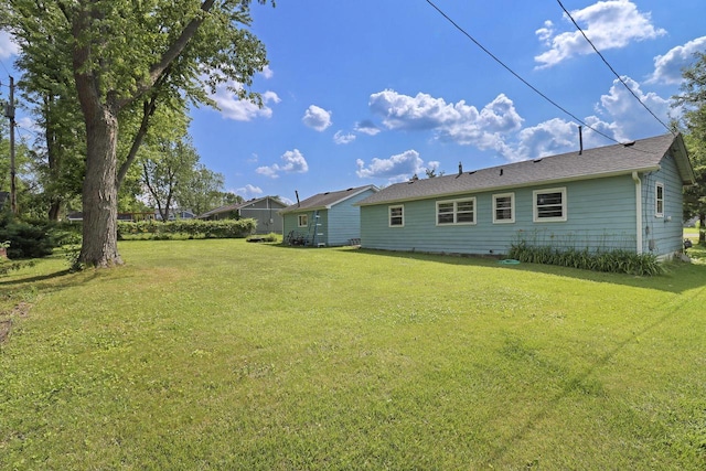 6123 245th Ave, Salem, WI 53168 - back of house featuring a lawn
