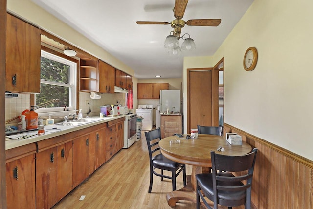 6123 245th Ave, Salem, WI 53168 - dining space with light wood finished floors, wainscoting, and a ceiling fan