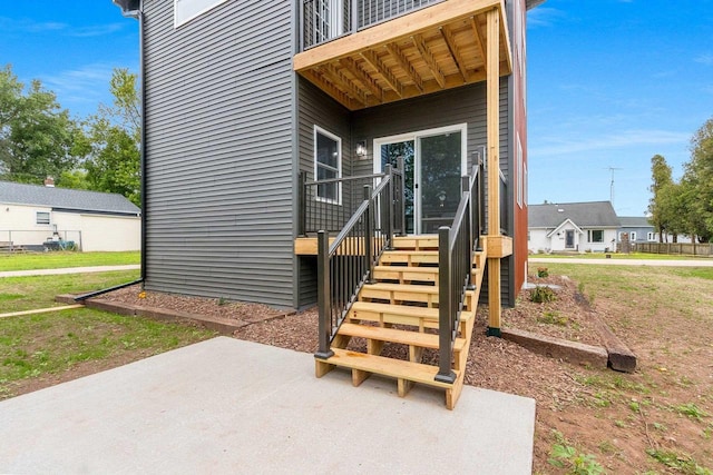 120 Eleonor St, Two Rivers, WI 54241 - view of exterior entry with a patio area
