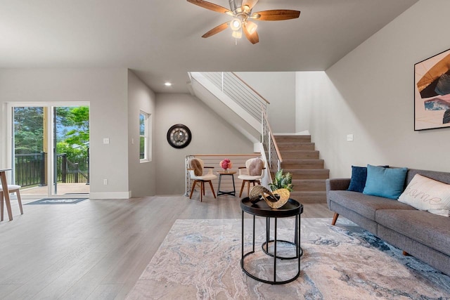 120 Eleonor St, Two Rivers, WI 54241 - living room with stairs, wood finished floors, ceiling fan, and recessed lighting