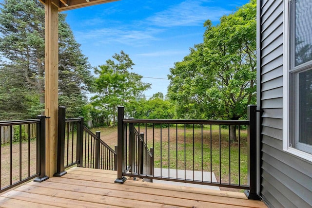 120 Eleonor St, Two Rivers, WI 54241 - wooden terrace featuring view of wooded area