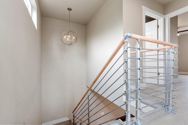 120 Eleonor St, Two Rivers, WI 54241 - stairs with a chandelier and wood finished floors